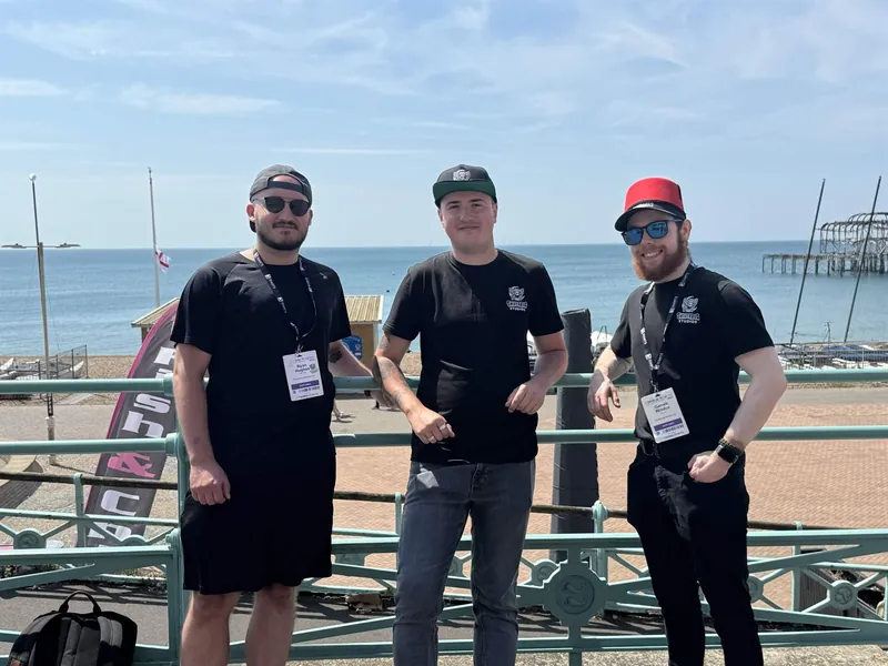 Ryan, Lewis and Garrett in Shiverbug t-shirts on Brighton seafront.